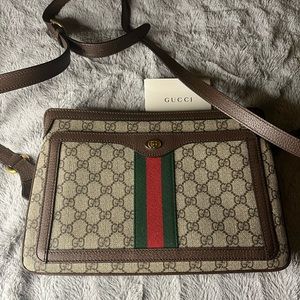 Gucci Bag from Hawaii. Great Condition with tags, leather strap, very roomy.